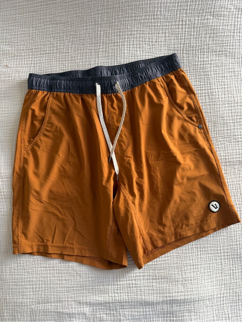 Vuori Men’s Hybrid Shorts in Rust Orange with Charcoal Waistband